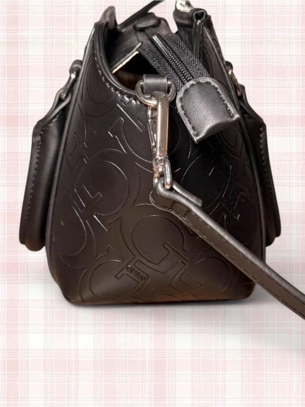 Guess design carrying embossed